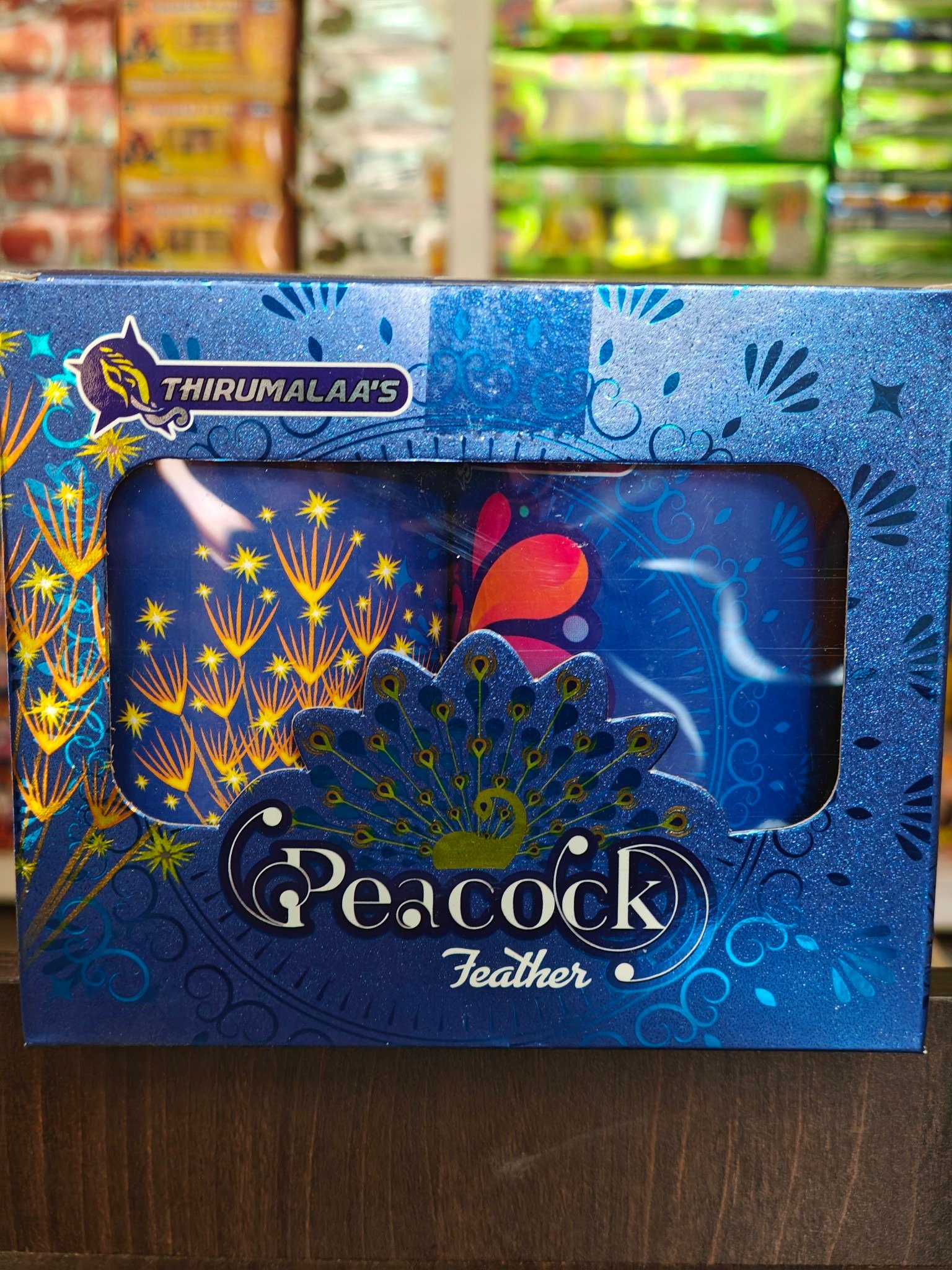 peacock feather (thirumalaas)